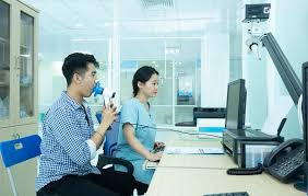 Description: A person and person sitting at a desk

AI-generated content may be incorrect.