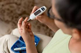 A person using a device to measure the blood sugar level

AI-generated content may be incorrect.